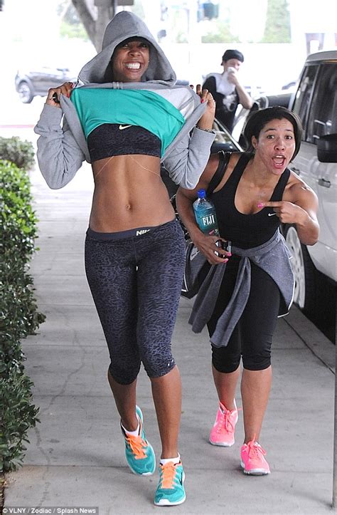 kelly rowland flashes her impressive abs after a trip to the gym daily mail online