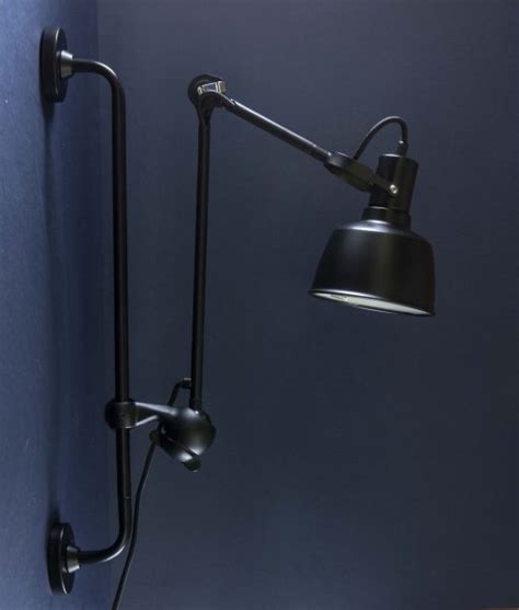 W uses (3) 60 watt medium base bulbs or led equivalent (not included) dimmable: Industrial Bar Wall Light Colton Black Metal Adjustable