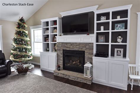 Built In Bookcases With Electric Fireplace And Stone Hearth • Deck