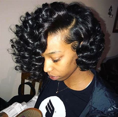 This is a look that most curlies achieve by pulling their hair up in a puff, but there's no need. Cute curly bob @nekevia_ - Black Hair Information