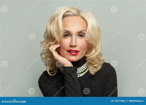 Fashion Portrait Of Beautiful Blonde Woman In Pearls Necklace Stock