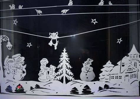 Украшаем окна на Новый год — снежинки вытынанки рисунки наклейки