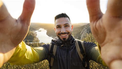 Male Hiker Taking Selfie In Monfrague National Park Stock Photo