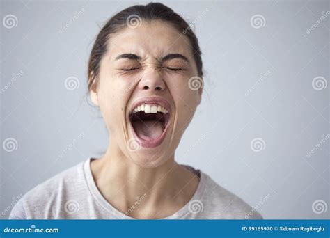 Portrait Of Shouting Young Woman Stock Photo Image Of Female Face