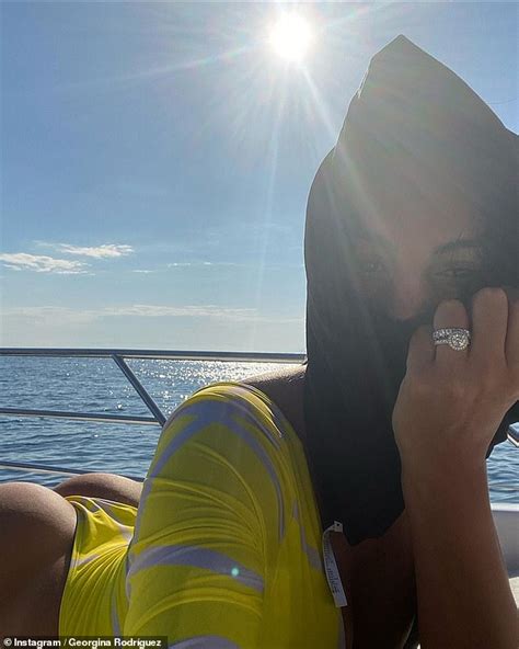 Georgina Rodriguez Puts On A Busty Display And Flaunts Her Derrière As She Basks In The Sun