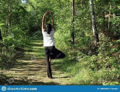 Girl Exercising Yoga Tree Pose Stock Image Image Of Sports