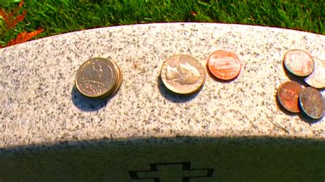This Memorial Day Many Will Visit Cemeteries To Pay Their Respects To Fallen Soldiers With Coins