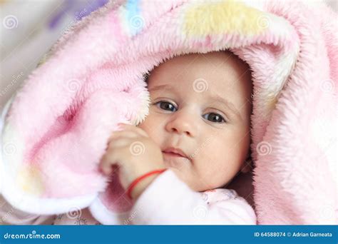 Baby Covered In Pink Blanket Stock Photo Image Of Playing Baby 64588074