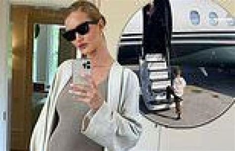 Pregnant Rosie Huntington Whiteley Shows Off Her Bump In Chic Grey Dress