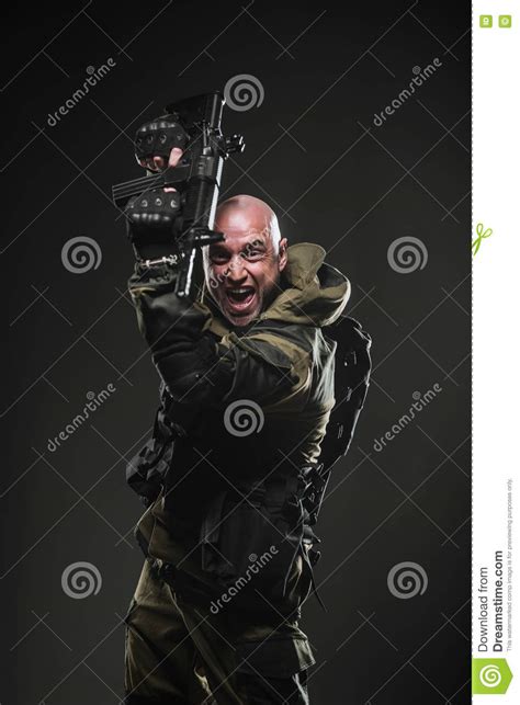 Soldier Man Hold Machine Gun On A Dark Background Stock Image Image