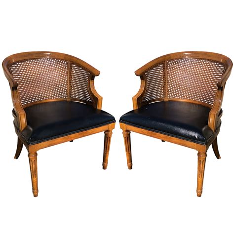 Featuring a curved high back, plush cushioned seat and deeply tufted. Pair of Mid Century Cane Barrel Back Club Chairs by Drexel ...