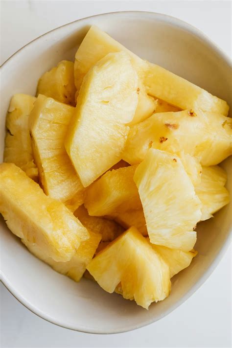 Healthy Fresh Sliced Pineapple In White Bowl · Free Stock Photo