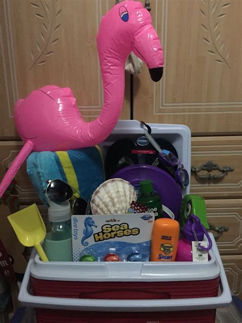 Looking for promotional giveaway ideas for your next trade show? Beach/cooler raffle basket | Beach gift basket, Summer ...
