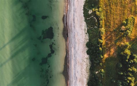 Download Wallpaper 1680x1050 Ocean Beach Aerial View Water Sand