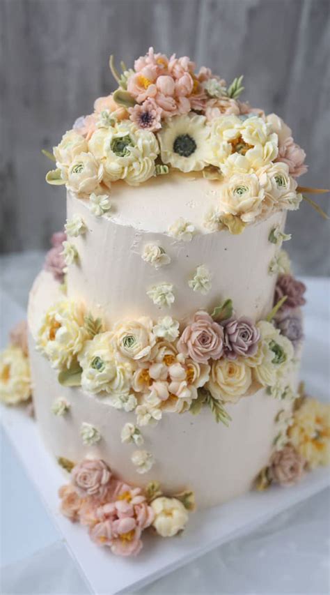 the prettiest buttercream floral art wedding cakes with a modern spin