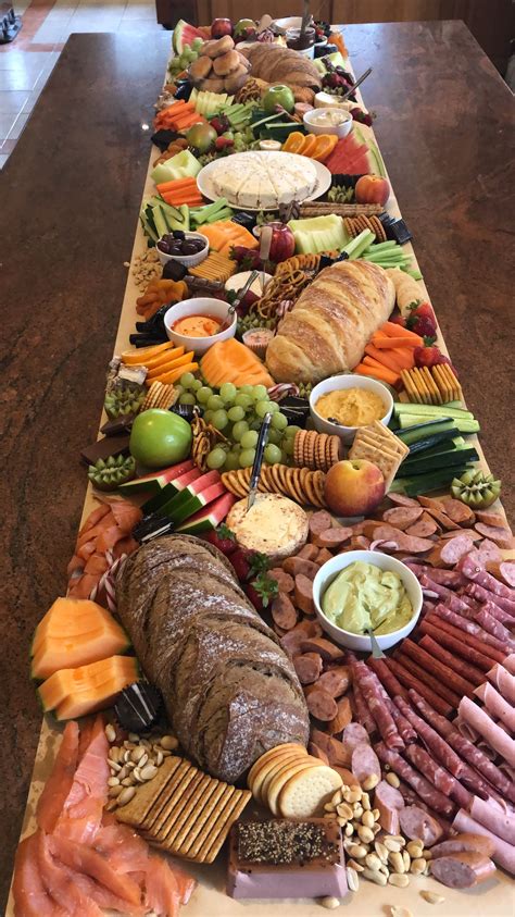 This is how we did it, and it was a great deal. Grazing Board Table | Food platters, Buffet food, Party ...