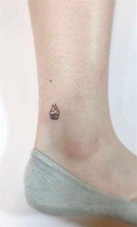 Tiny Perfect Line Cupcake Tattoo Cupcake Tattoos Dainty Tattoos