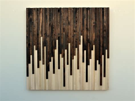 The artist hand cuts each layer of baltic birch and bubinga wood or wenge, then meticulously stacks and glues them together before carving and sanding them into the final form. Rustic Wood Wall Art Wood Sculpture Wall by moderntextures