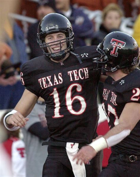 Two Football Players Are Congratulating Each Other