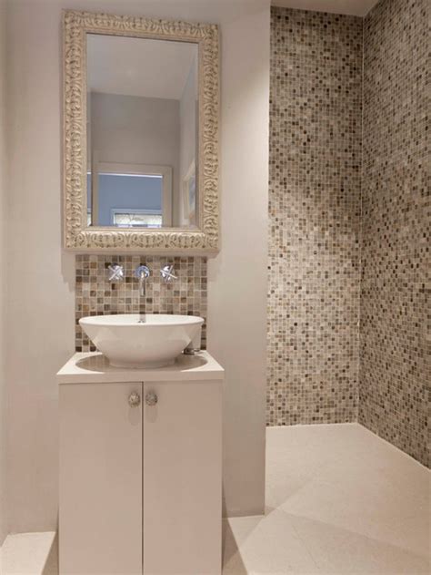 Then place the base of the tile on the timber shelf and flatten it onto the wall. Tile Bathroom Wall | Houzz