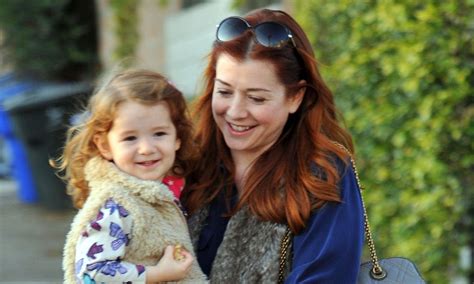 A portrait of the stunningly georgeus alyson hannigan. Alyson Hannigan and look-alike daughter wear matching fur ...