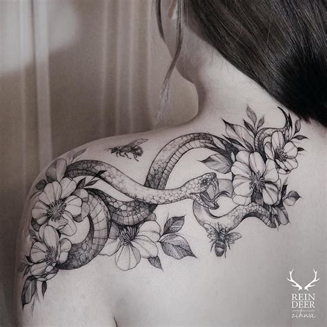 Nowadays, snake tattoos are wrapped up in arms, legs, necks, wrists, back of the ears, etc. Reindeer Ink on Instagram: "" | Flower shoulder tattoo ...