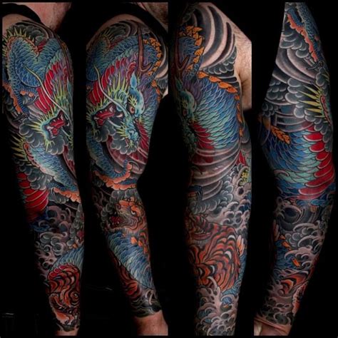 45+ dragon and tiger tattoos & designs with meanings. Mike Rubendall | Dragon sleeve tattoos, Tiger tattoo ...