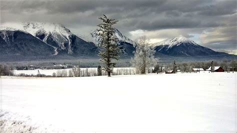 Northern Interior British Columbia Winter Scene Mountains And Dark