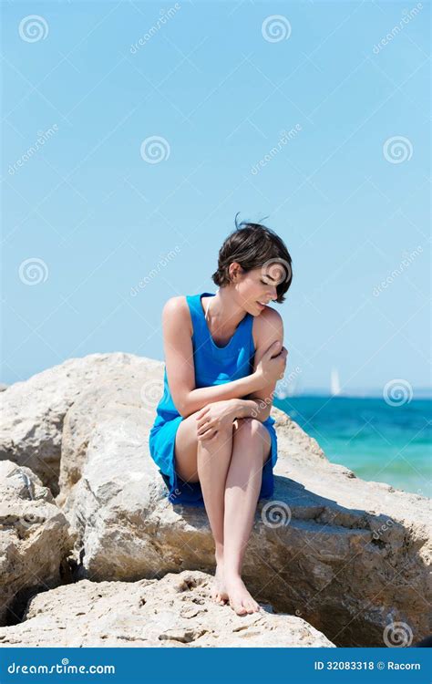 Woman Sitting On Rocks At The Seaside Stock Photo Image Of Recreation Leisure