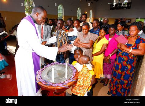 Baby Being Baptised Bukoba Kagera Region Tanzania Africa Stock