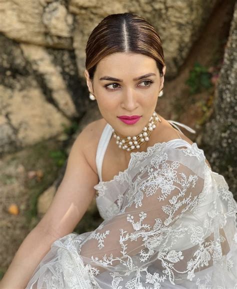Kriti Sanon Looks Breathtaking In A White Organza Saree With An Embellished Ruffled Hem Worth Rs
