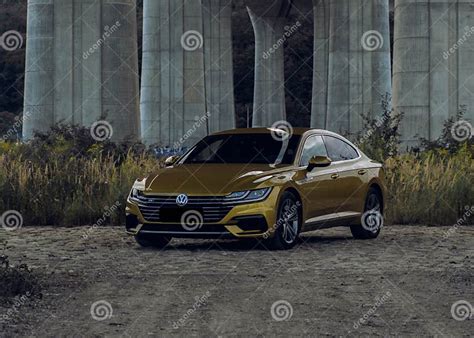Volkswagen Arteon Gold Color Under A Bridge Editorial Photography