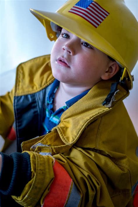 Young Firefighter With Hard Hat Stock Photo Image Of Helpful Costume