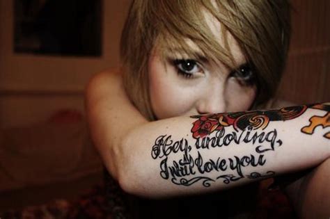 An amazing eye that is tattooed in a striking blue. Tattoo Ideas: Lyrics About Love | TatRing