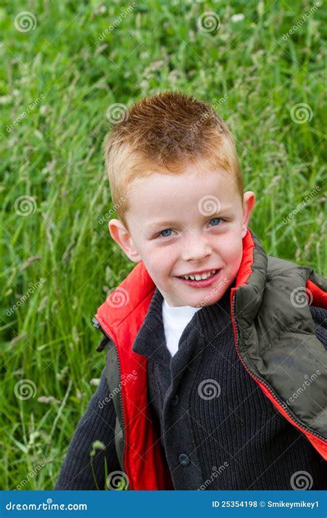 Young Boy Playing In The Fields Stock Photo Image Of Playing Gilet