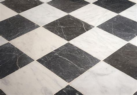 A Black And White Checkered Tile Floor