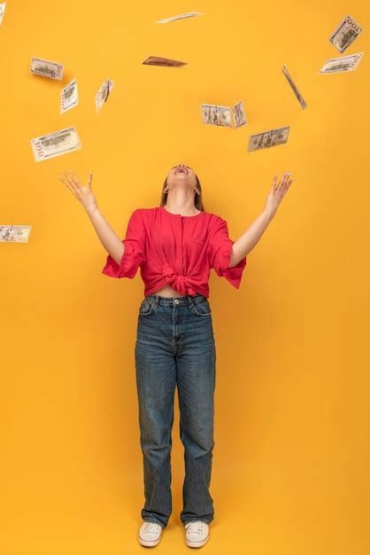 Premium Photo Happy Laughing Woman Tossing Up Dollar Bills While