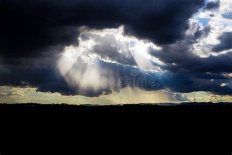Sun Rays Through Storm Clouds Stock Photo Image Of Gray Meteorology
