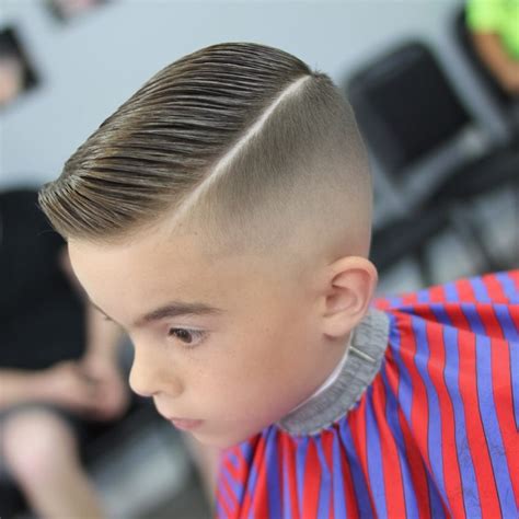 Often, business haircuts make for quick and easy hairstyles for school, but sometimes young guys want something a little this boys hairstyle takes just as much gel and comb, but spikes it up good for the after party! Fade For Kids: 24 Cool Boys Fade Haircuts - Men's Hairstyles