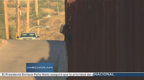Video Catches Two Suspected Mexican Drug Smugglers Climbing Over Border