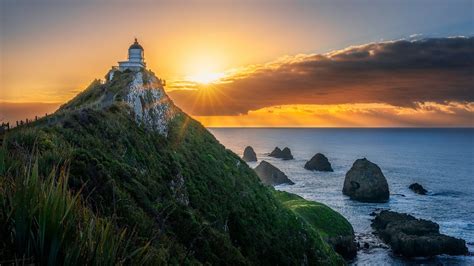 Dawn Lighthouse New Zealand Ocean During Sunrise Hd Nature