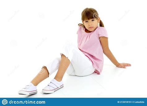cute stylish preteen girl sitting on floor stock image 213318151