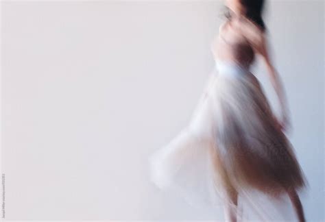 Movement Image Of Unrecognisable Woman Dancing In A Long Dress By