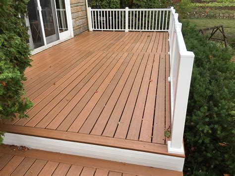 Hand Made Original Decking On A Three Tier Deck Replaced With Composite