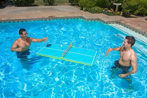 This Floating Ping Pong Table For The Pool Has Optional Legs For Use On Dry Land