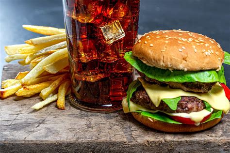 Fresh Burgers With Cold Drink And Fries On The Black Table Creative