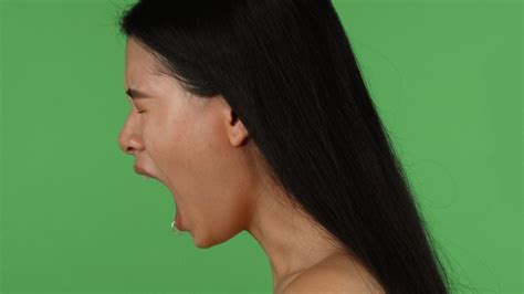 Asian Depressed Or Angry Woman Screaming On Chromakey By Kotlyarn