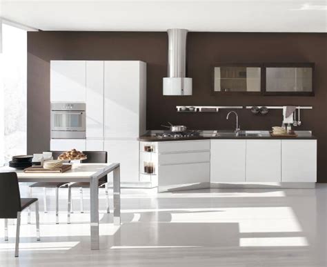 This midcentury modern kitchen in rancho mirage, california features white slab front cabinets, open shelving, white subway tile backsplash, chrome hardware, and walnut flooring. New Modern Kitchen Design with White Cabinets - Bring from ...