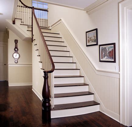 Once one piece is cut, apply construction adhesive to the back of the beadboard paneling piece. B.E. Interiors: Beadboard