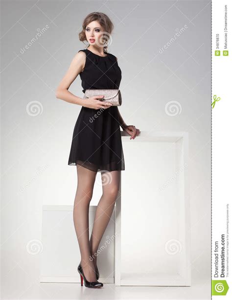 Beautiful Woman With Long Legs Dressed Retro Elegant Posing In The